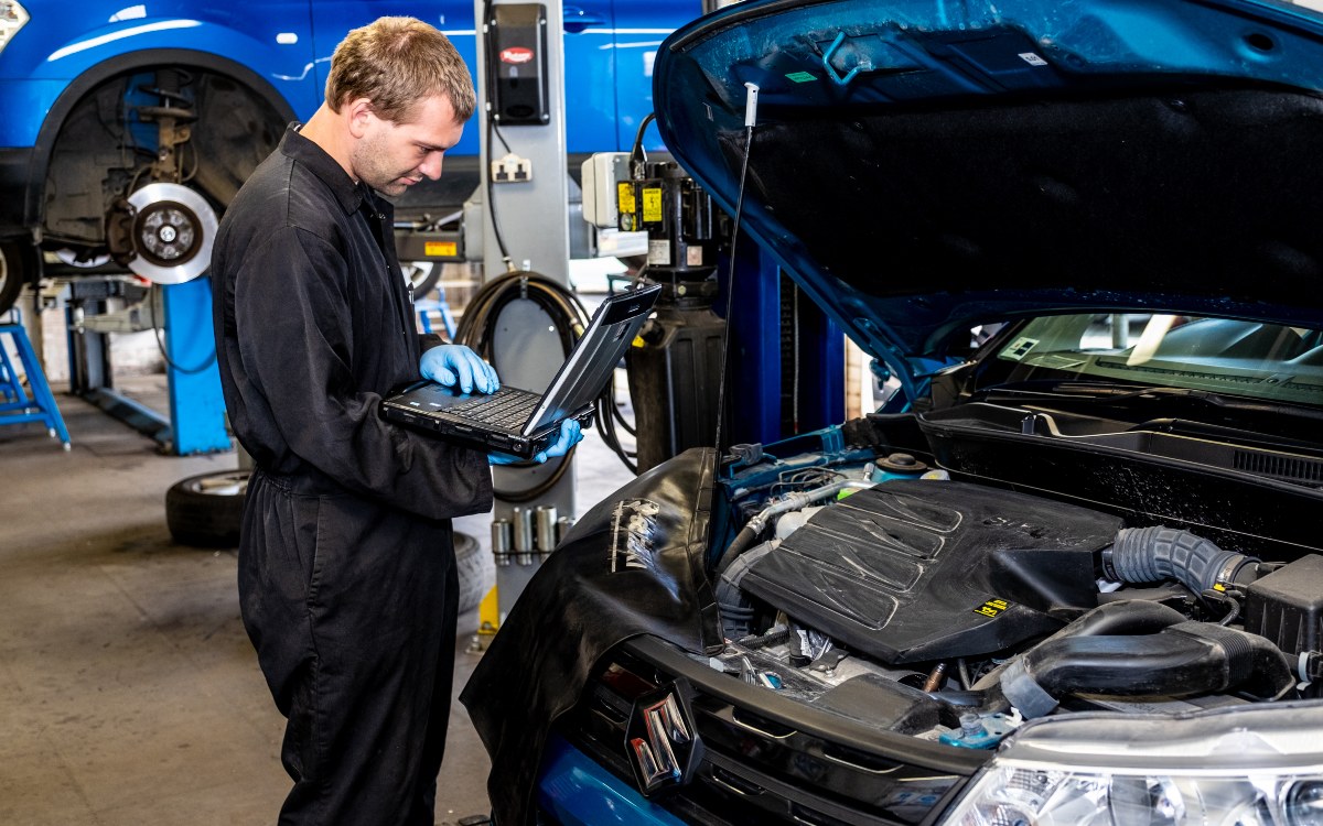 A technician performs a car service