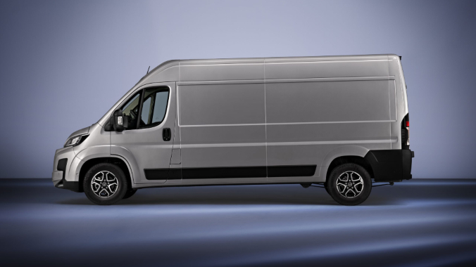 Toyota Proace Max Electric van in silver, side view.