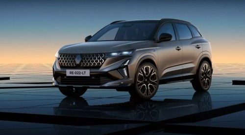 Angled front photo of a new Renault Austral, highlighting the bold and unique front design with the grille and LED lighting.