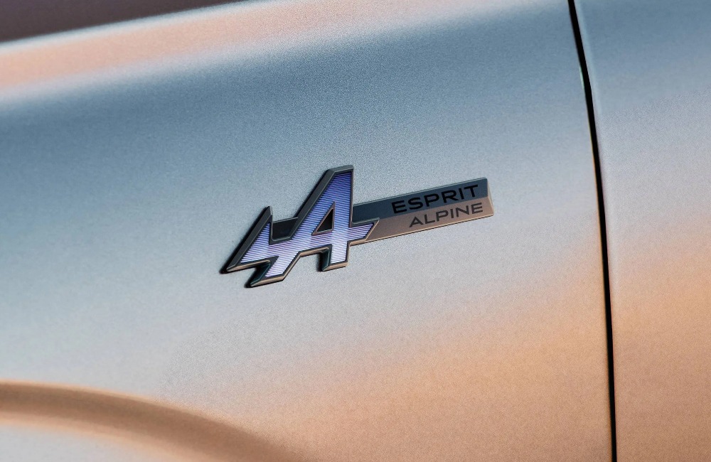 Close up shot of a cars badging, branding the ESPRIT ALPINE name.