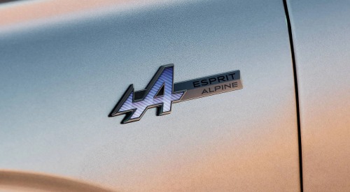 Close up shot of a cars badging, branding the ESPRIT ALPINE name.