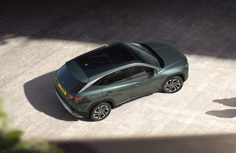 Top-down view of a new Hyundai TUCSON, showing off the bold stance and detailing along the car.