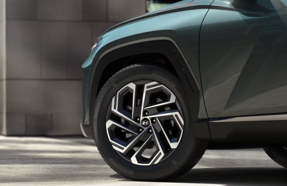 Close up shot of an alloy wheel, showing off Hyundai branding.