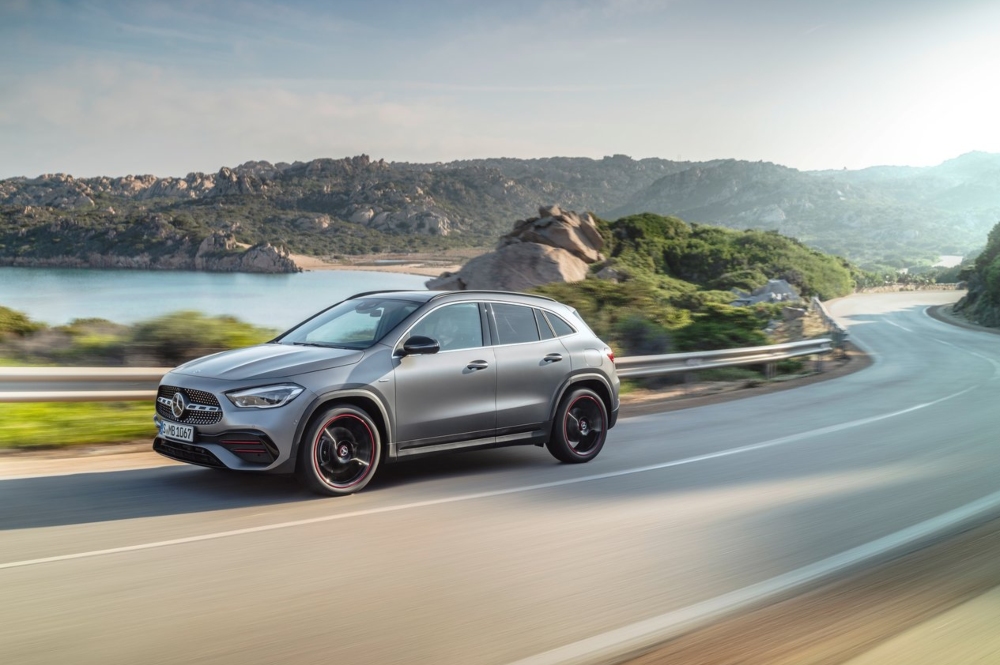 Used Mercedes SUV for sale, Mercedes GLC driving along a coastal road.