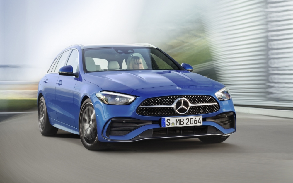 Used Mercedes-Benz C-Class Estate in blue, front view.