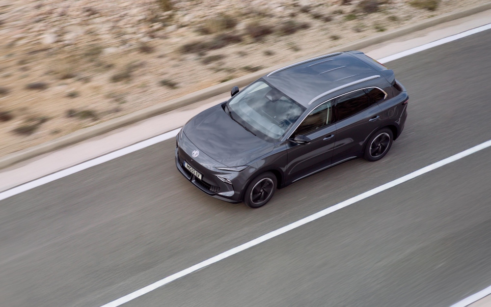 Used MGS5 EV Trophy - Exterior MG5 EV Trophy Long Range driving along a desert road.