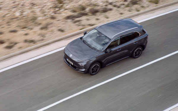 Used MGS5 EV Trophy - Exterior MG5 EV Trophy Long Range driving along a desert road.