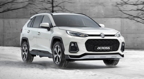 Front shot of a new Suzuki Across driving through snow at speed.