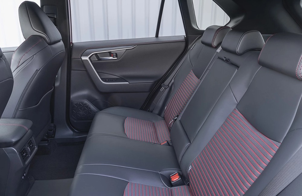 Interior shot of a Suzuki Across, showing off the comfortable and stylish rear seating.