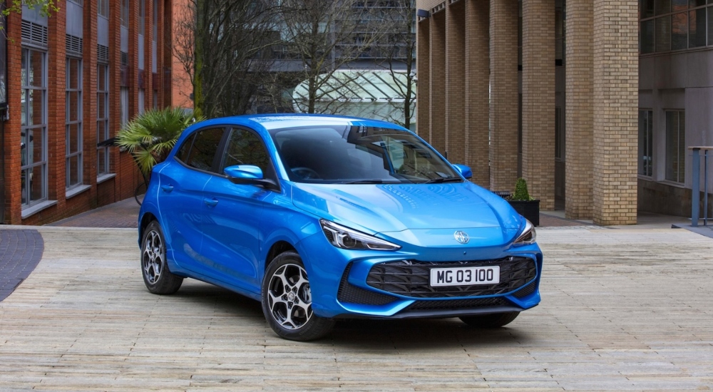 New MG car - MG3 parked outside a building.