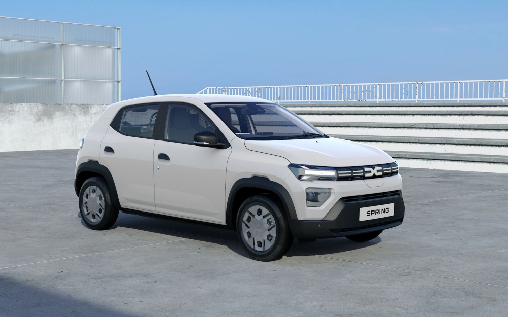 White Dacia Spring Cargo Electric front three quarter view.