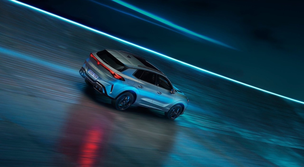 A CUPRA Terramar driving along a road at night; CUPRA Terramar used car performance