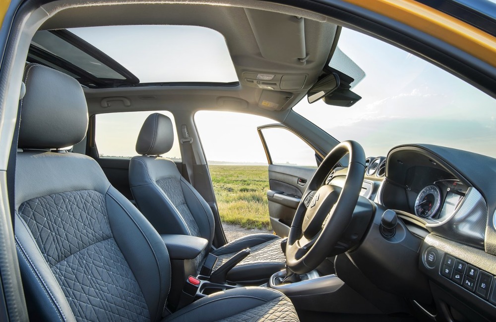 Interior shot of a used Suzuki Vitara showing off the drivers position and comfortable seating.