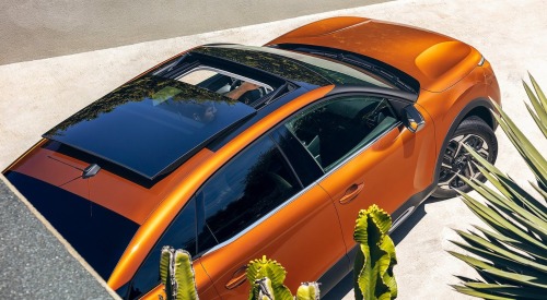 Angled top down view of a Citroen C4, showing off an open sunroof.