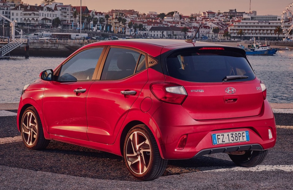 Rear angled shot of a used Hyundai i10, showing off the tailgate, compact dimensions, and alloy wheels.
