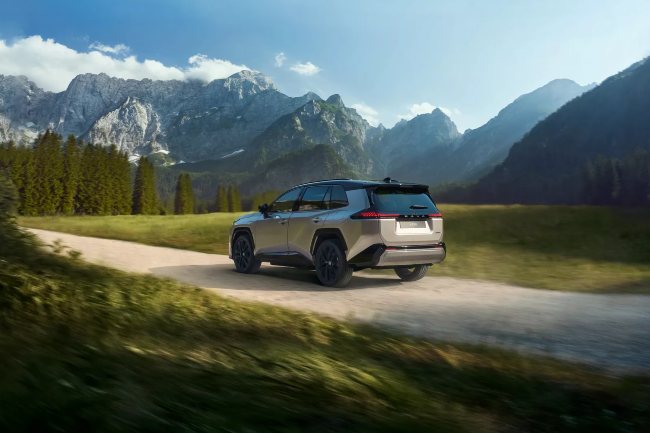 New Toyota RAV4 For Sale driving along scenic mountain view