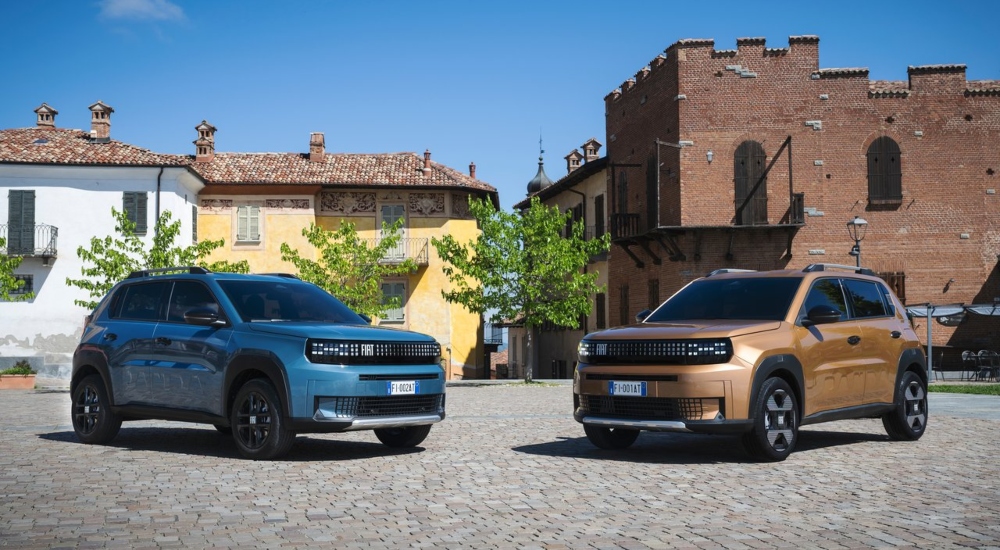 Two Fiat Grande Panda Hybrid cars one in Lunar Bronze and the other in Lago Blue; New Fiat Grande Panda Hybrid for Sale