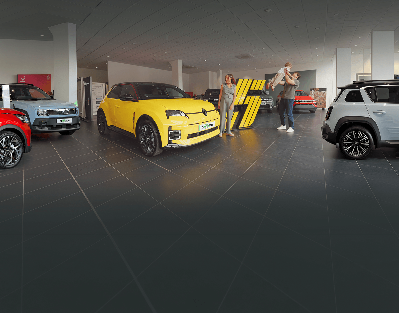 Stoneacre homepage banner featuing cars in a showroom from Renault and Dacia