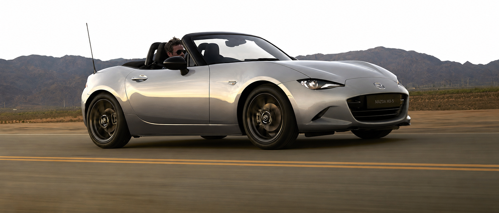New Mazda MX-5 2026 driving along road