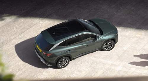 Top-down view of a new Hyundai TUCSON, showing off the bold stance and detailing along the car.
