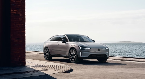 Volvo ES90 parked on a road near the sea: Volvo ES90 Used for Sale