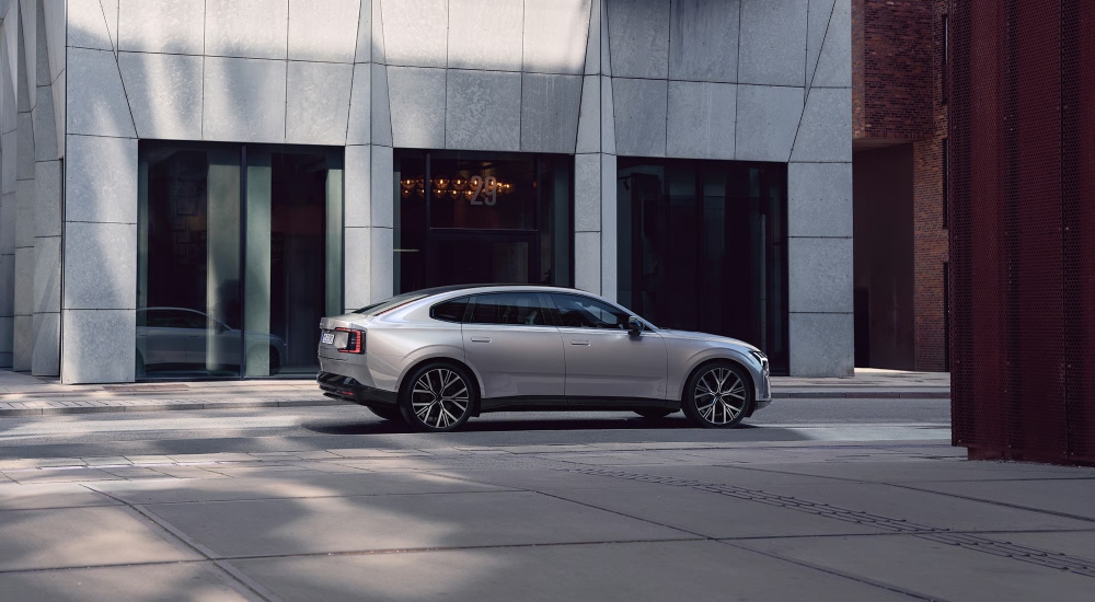 Side view of a Volvo ES90 on a road; Used Volvo ES90 cars for sale