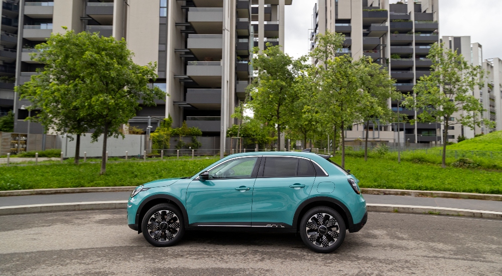 Side view of a Fiat 600 Hybrd in Sky Blue; New Fiat Hybrid 600