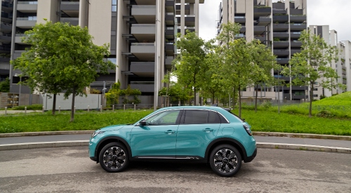 Side view of a Fiat 600 Hybrd in Sky Blue; New Fiat Hybrid 600