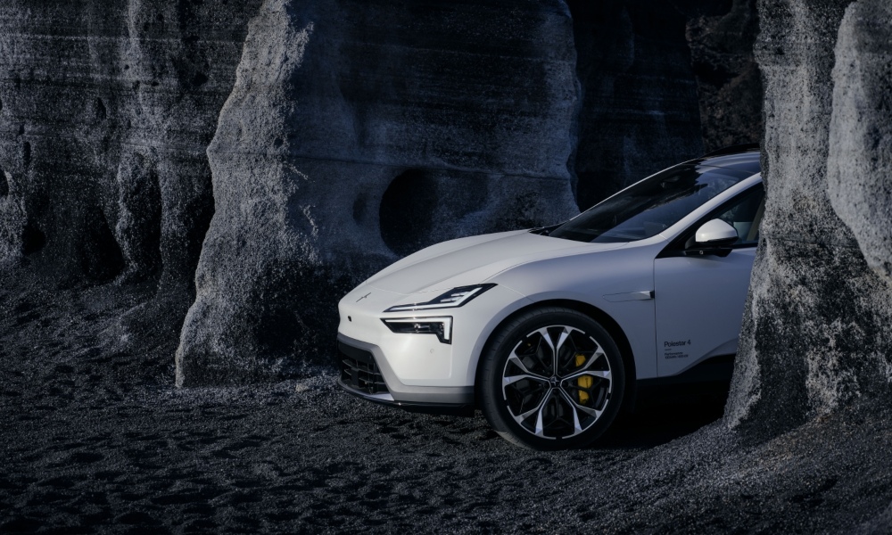 New Polestar 4 SUV in a rocky landscape, front three-quarter view
