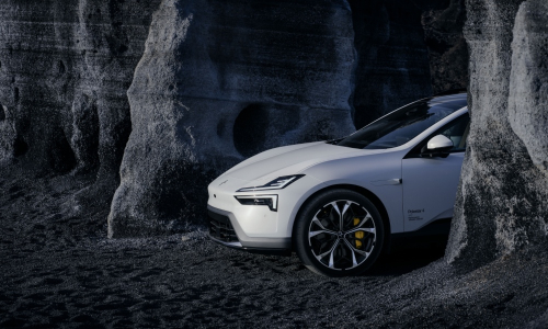 New Polestar 4 SUV in a rocky landscape, front three-quarter view