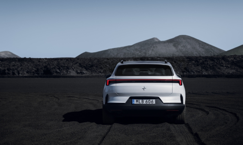 New Polestar 4 SUV in a rocky landscape, rear view