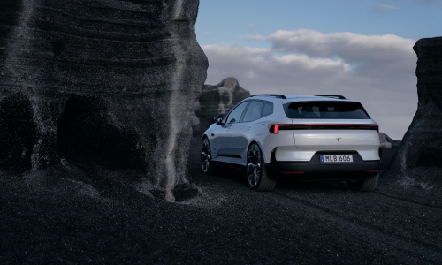 New Polestar 4 SUV in a rocky landscape, rear three-quarter view
