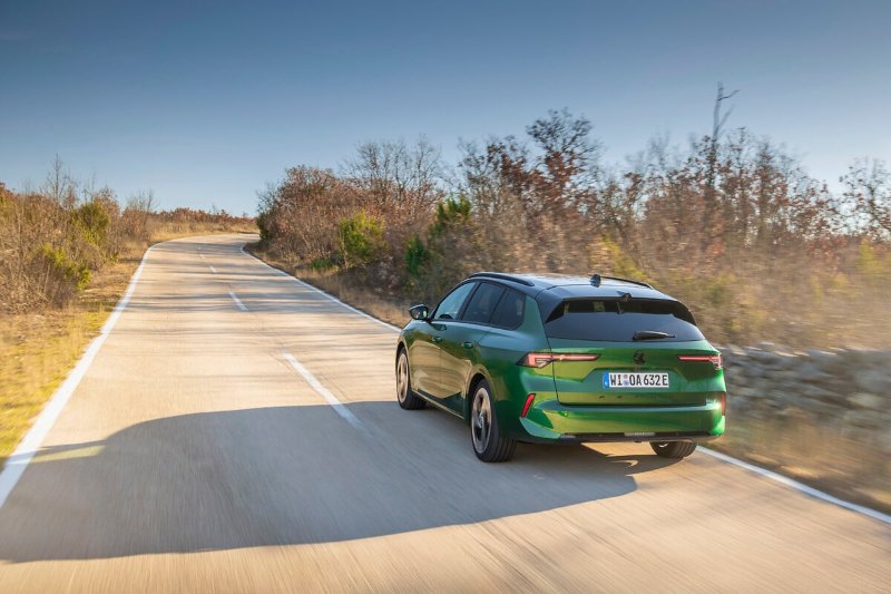 The new Vauxhall Astra Sports Tourer Electric driving up the road