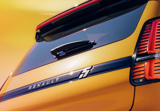 Close up rear shot of a yellow Renault 5.