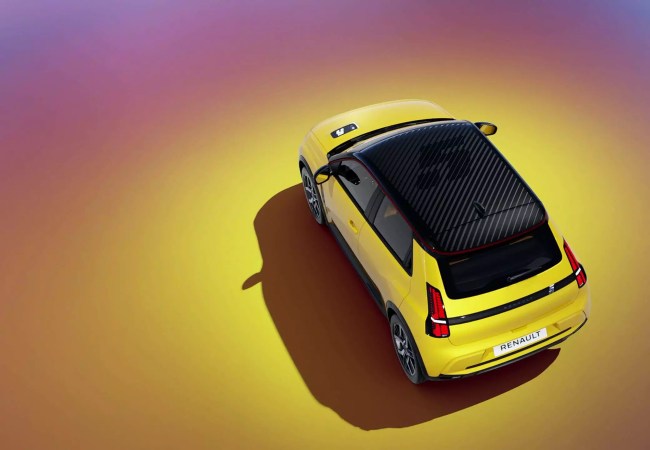 Top down view of a new Renault 5 with a branded roof decal.