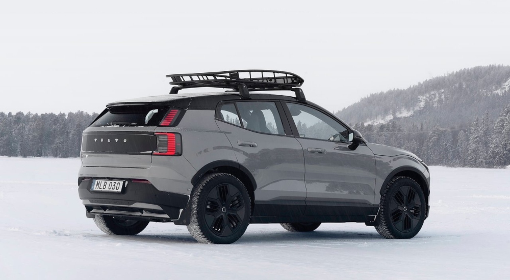 Rear view of the Volvo EX30 Cross Country in snow; Volvo Ex30 Cross Country Motability Scheme car