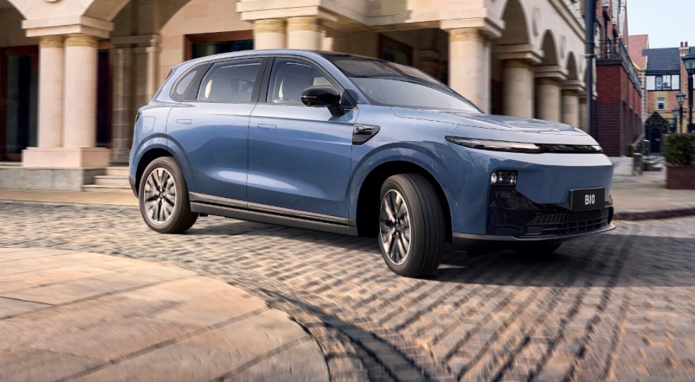 A new Leapmotor B10 Electric driving round a corner at speed within a town setting.
