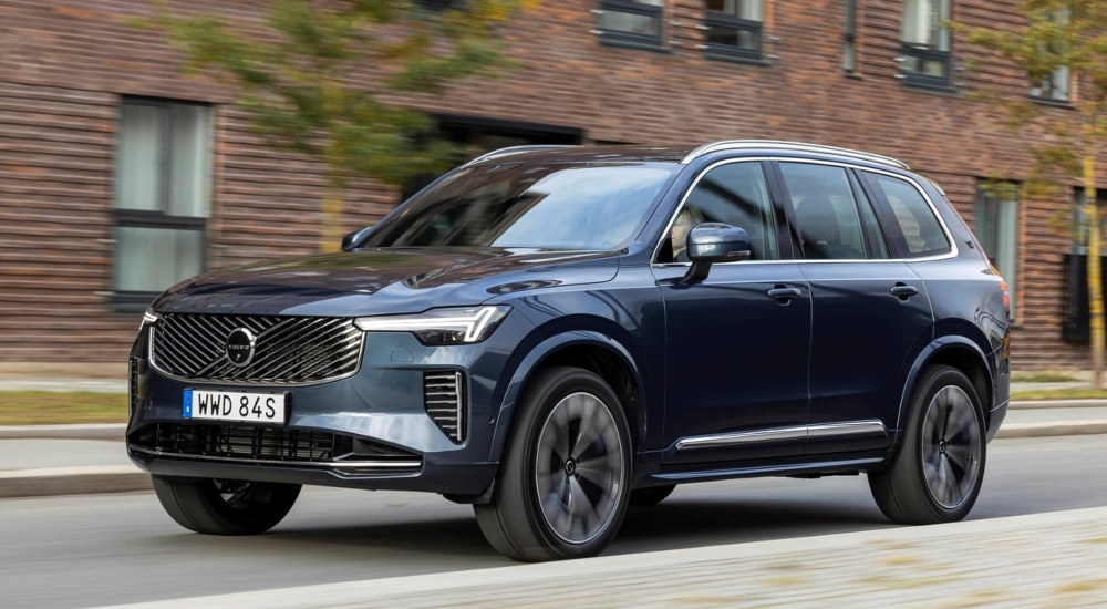 Volvo XC90 driving along a road; Second-hand Volvo XC90 for sale