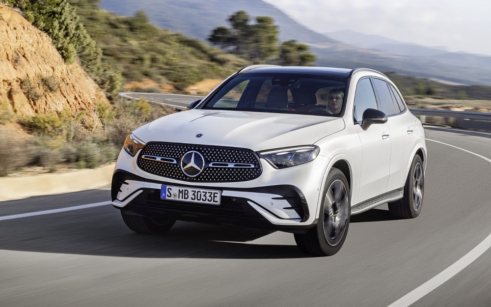 White Mercedes-Benz GLC SUV Driving on a Rural Road