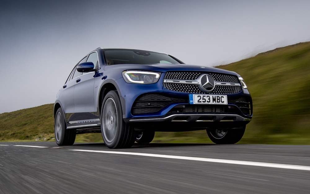 Blue Mercedes-Benz GLC SUV Driving on a Rural Road