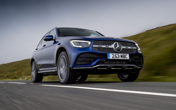 Blue Mercedes-Benz GLC SUV Driving on a Rural Road