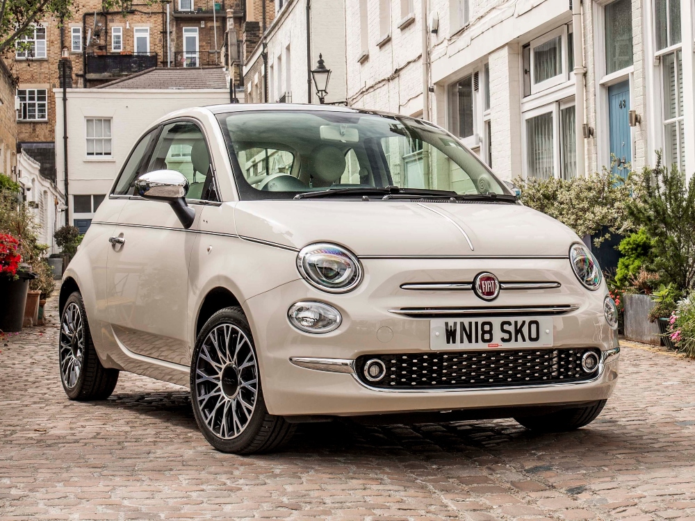 Front facing Fiat 500 parked on a street; Fiat Servicing