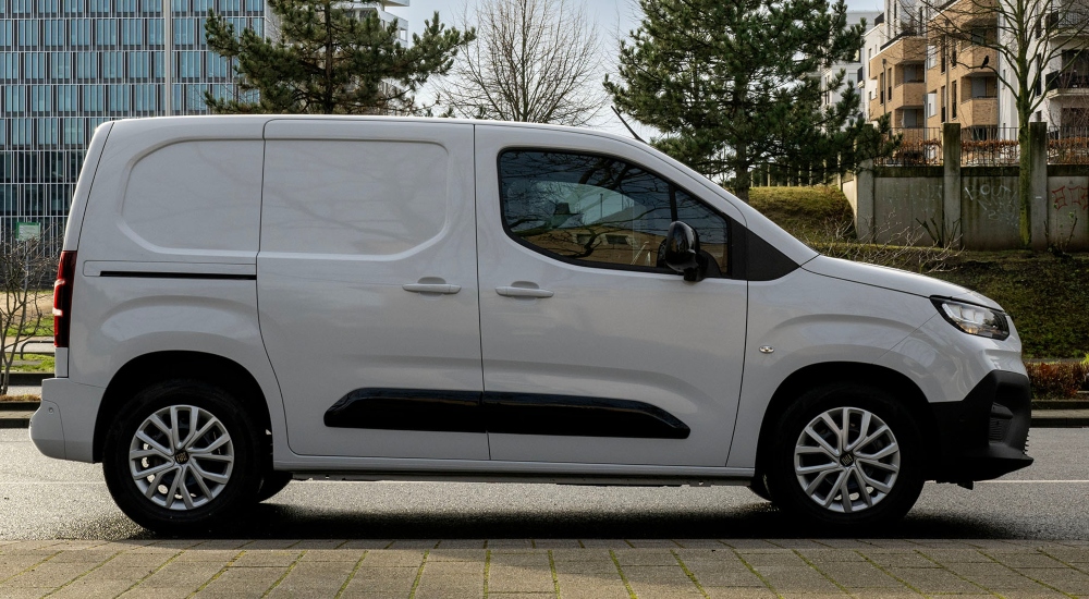 Side view of a Fiat Doblo van; New fiat small van
