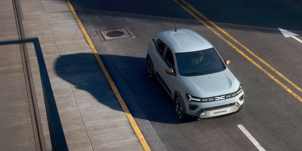Dacia Spring Driving on the Road