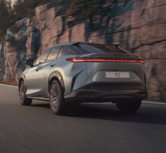 Lexus RZ Driving on a Mountain Pass
