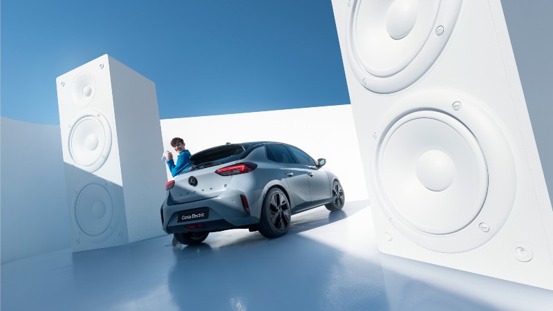 New Vauxhall Corsa Electric white speakers behind it