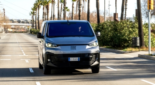 A Fiat E-Scudo driving down a road; New Fiat E-Scudo finance deals