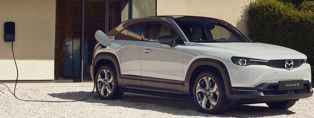 Mazda-mx-30-plugged-in-on-charge-driveway