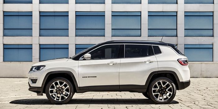 white jeep compass left side view parked white jeep compass left side view parked