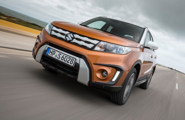 Orange and White Suzuki Vitara